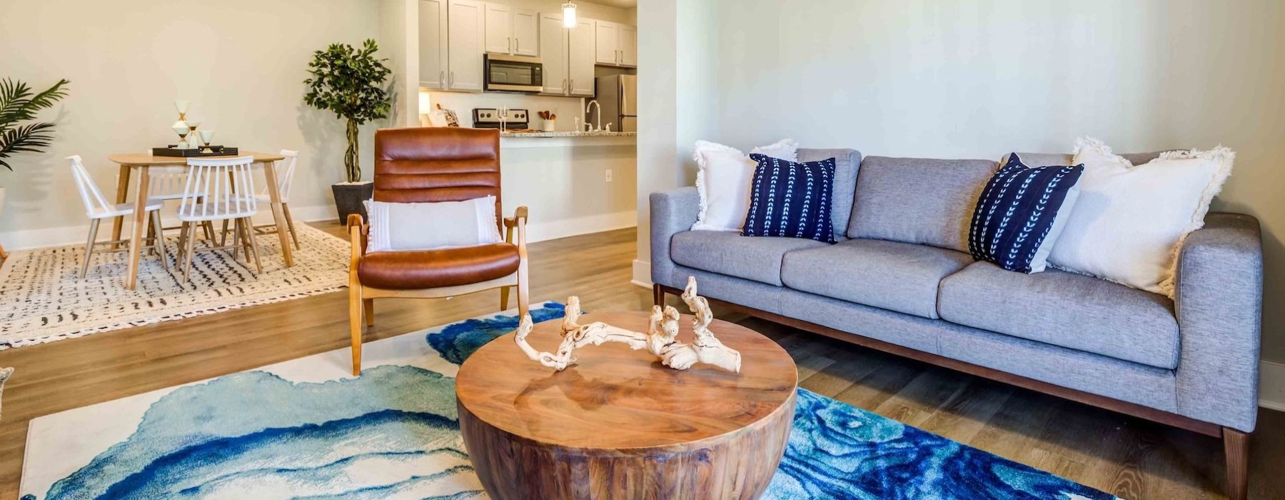 a living room with a couch and a chair