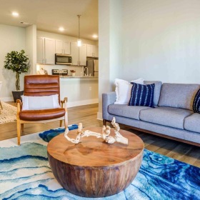 a living room with a couch and a table