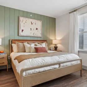Bedroom with natural lighting and high ceilings