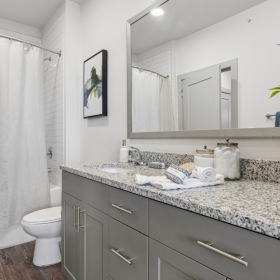 Bedroom with natural lighting and high ceilings