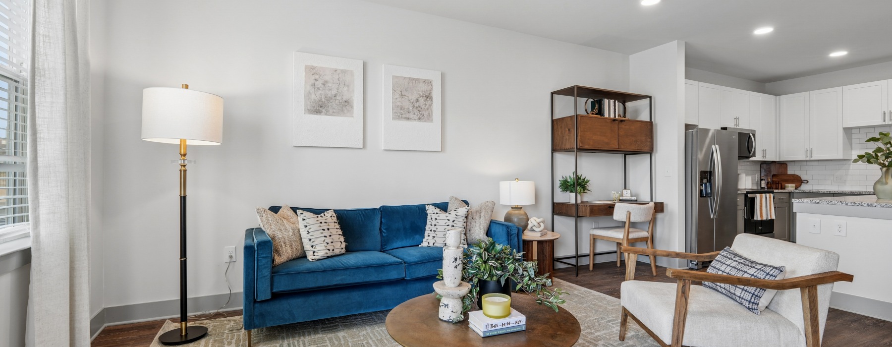 a living room with a couch and a chair