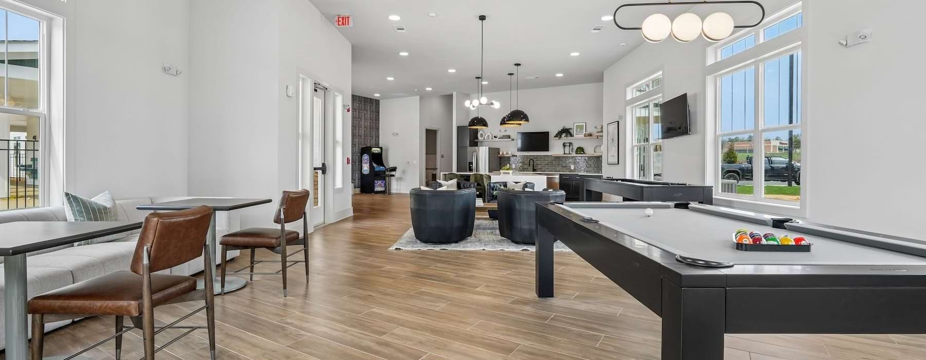 a gameroom with shuffleboard